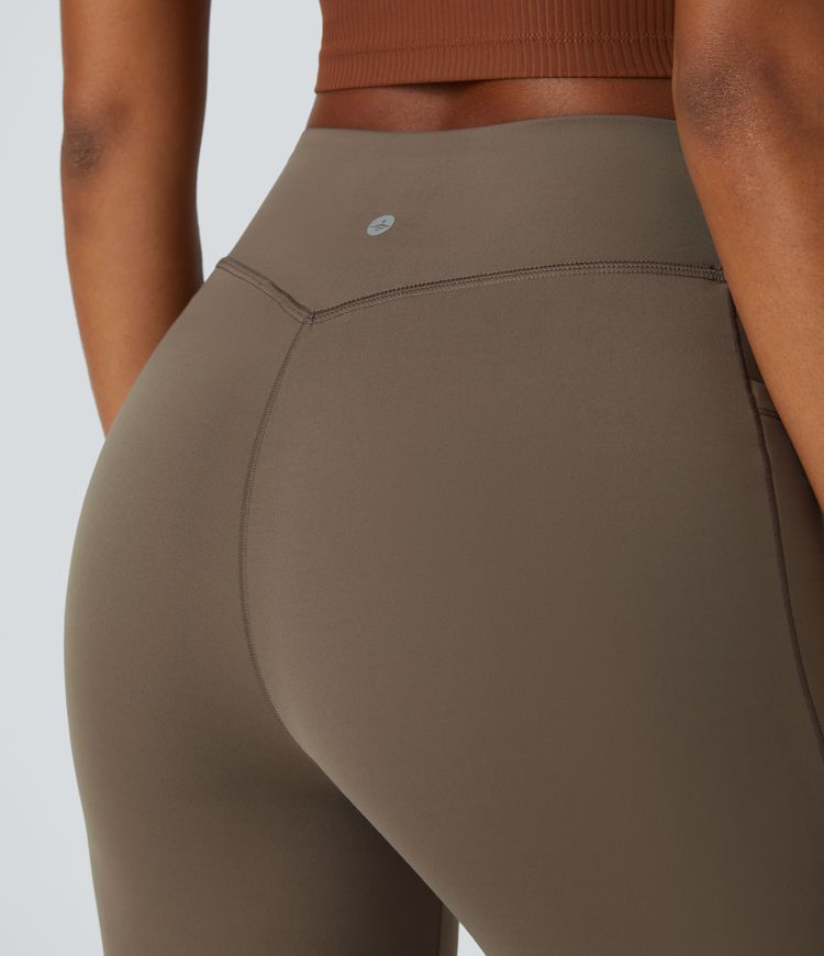 Leggings UltraSculpt™ acampanado longitud completa correr bolsillo lateral control abdomen tiro medio