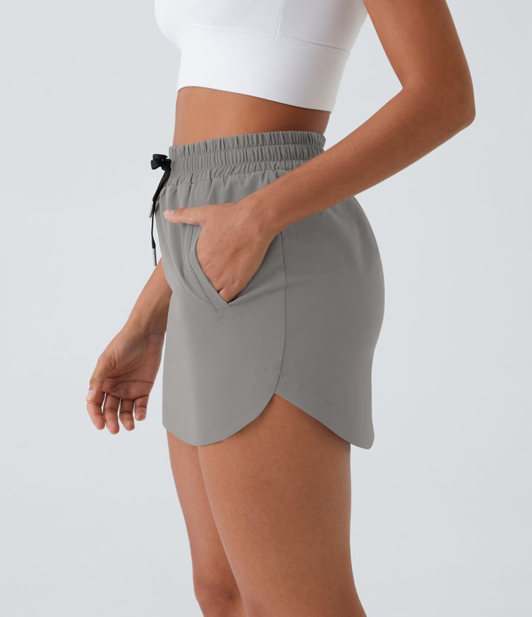 High Waisted Drawstring Pocket 2-in-1 Curved Hem Mini Golf Skirt
