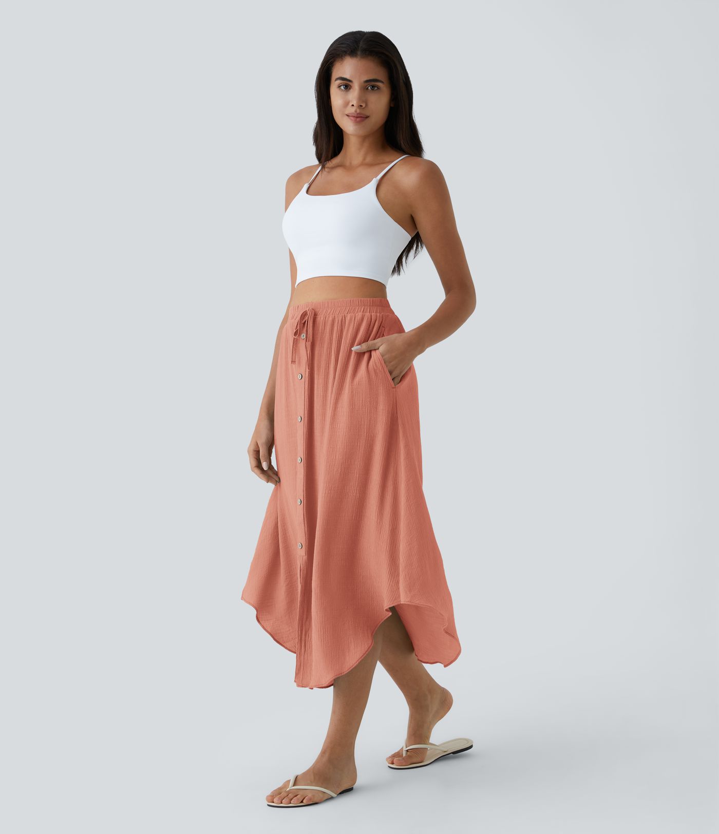 Falda midi casual de cintura alta con bolsillos y cordón fluido