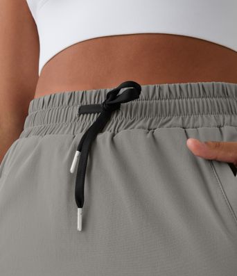 High Waisted Drawstring Pocket 2-in-1 Curved Hem Mini Golf Skirt