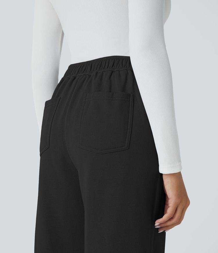 Pantalón polar tiro alto botón múltiple bolsillo pierna recta