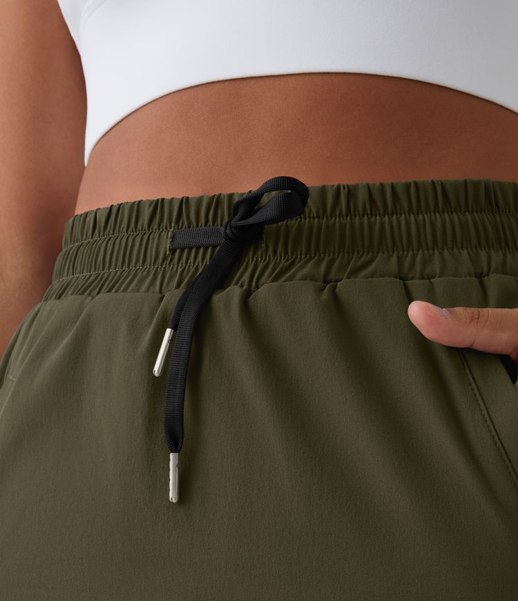 High Waisted Drawstring Pocket 2-in-1 Curved Hem Mini Golf Skirt