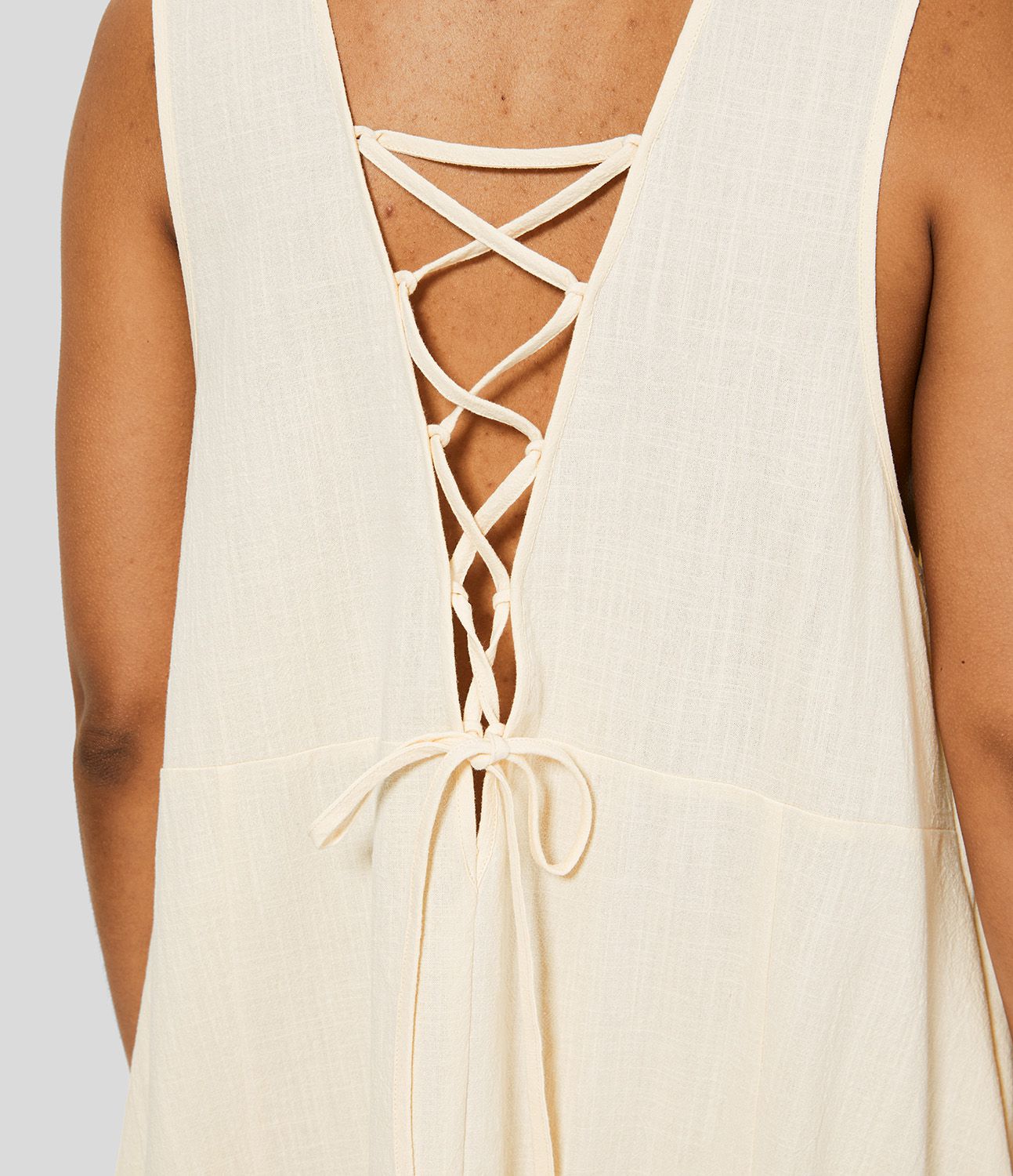 Sleeveless, backless, tie-up, casual flowy midi dress in cotton with side pockets and lacing