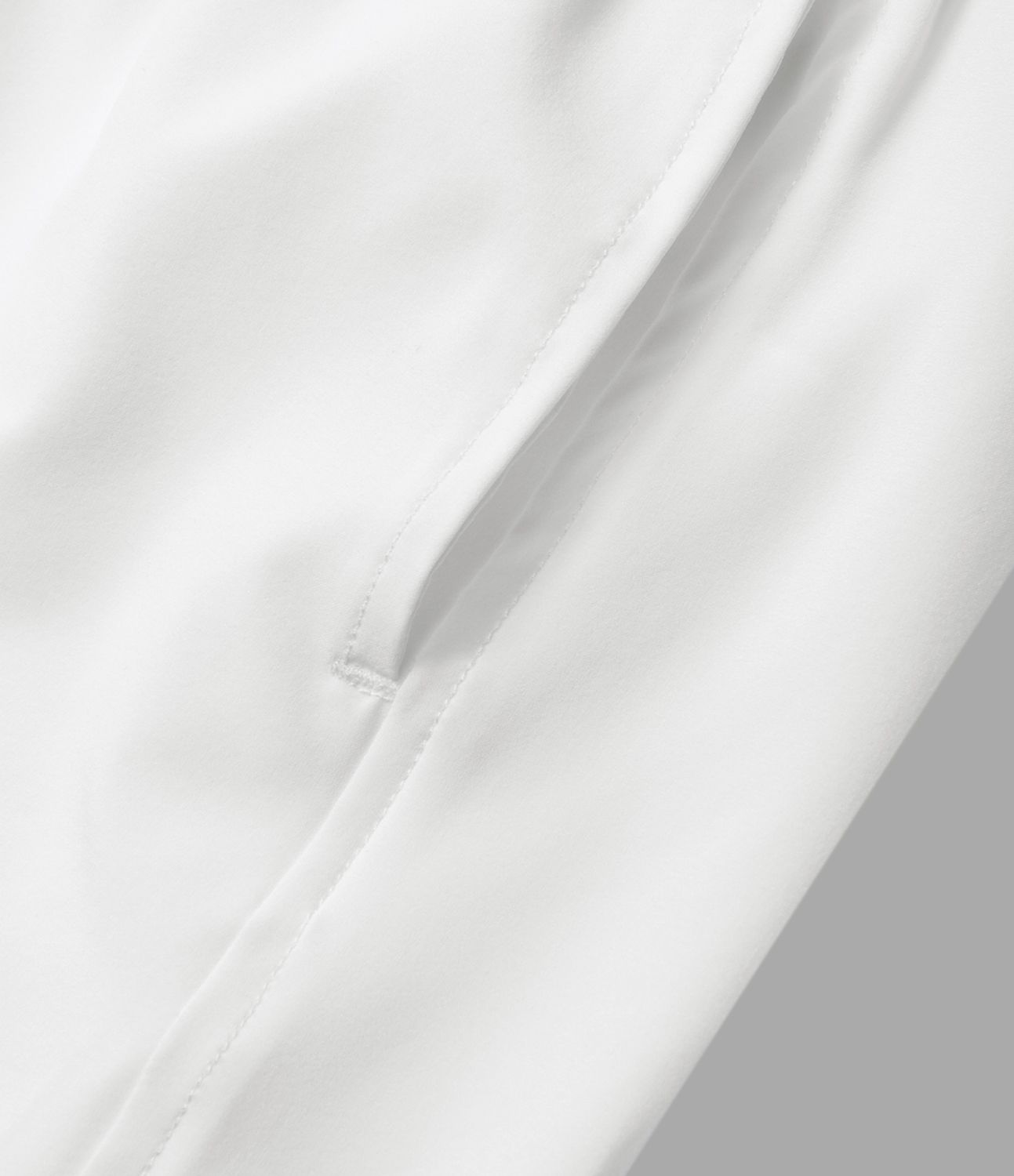 Breezeful™ 2-in-1 Crossover-Yoga-Shorts mit hohem Bund und Seitentaschen - schnelltrocknend, 10,2 cm