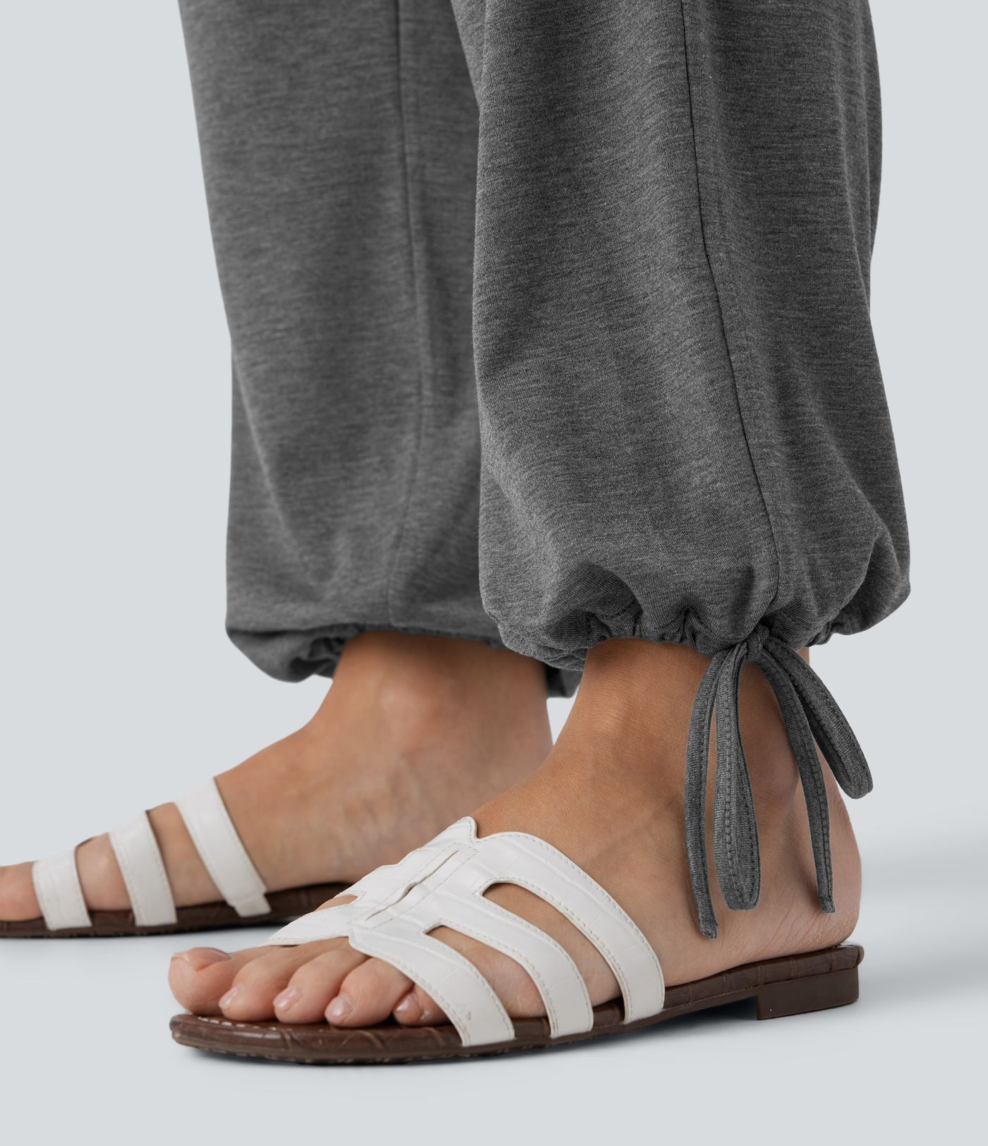 Kryžminės aukšto juosmens kišeninės tamprios laisvalaikio kelnės