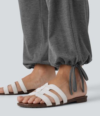 Kryžminės aukšto juosmens kišeninės tamprios laisvalaikio kelnės