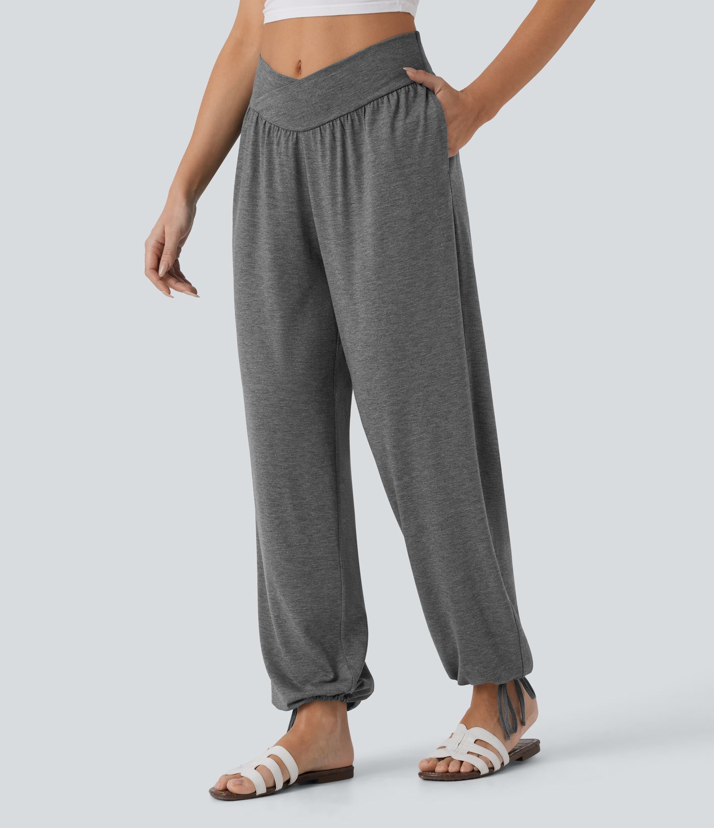 Kryžminės aukšto juosmens kišeninės tamprios laisvalaikio kelnės