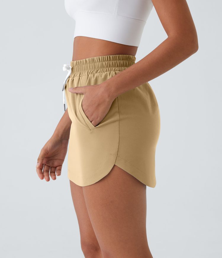 High Waisted Drawstring Side Pocket 2-in-1 Curved Hem Mini Golf Skirt