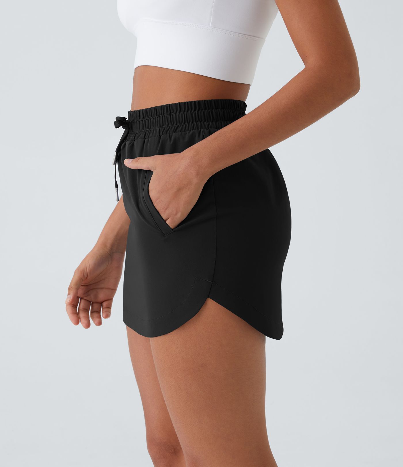 High waist drawstring side pocket 2-in-1 curved hem mini golf skirt