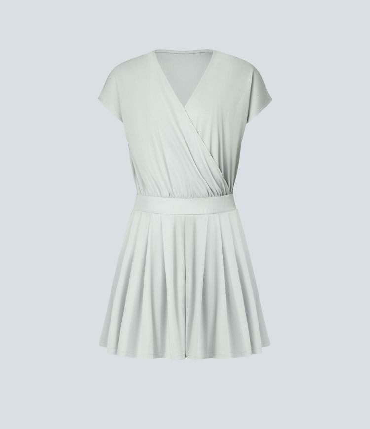 Mono de manga corta casual con cuello en V y bolsillos laterales en tela gofre