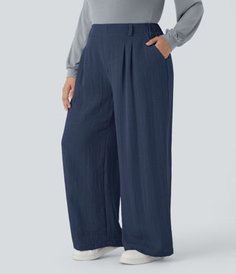 Pantalón tiro alto bolsillo lateral plisado pierna ancha fluido tacto lino talla grande