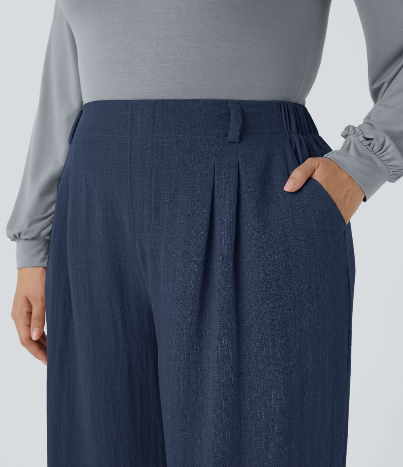 Pantalón tiro alto bolsillo lateral plisado pierna ancha fluido tacto lino talla grande