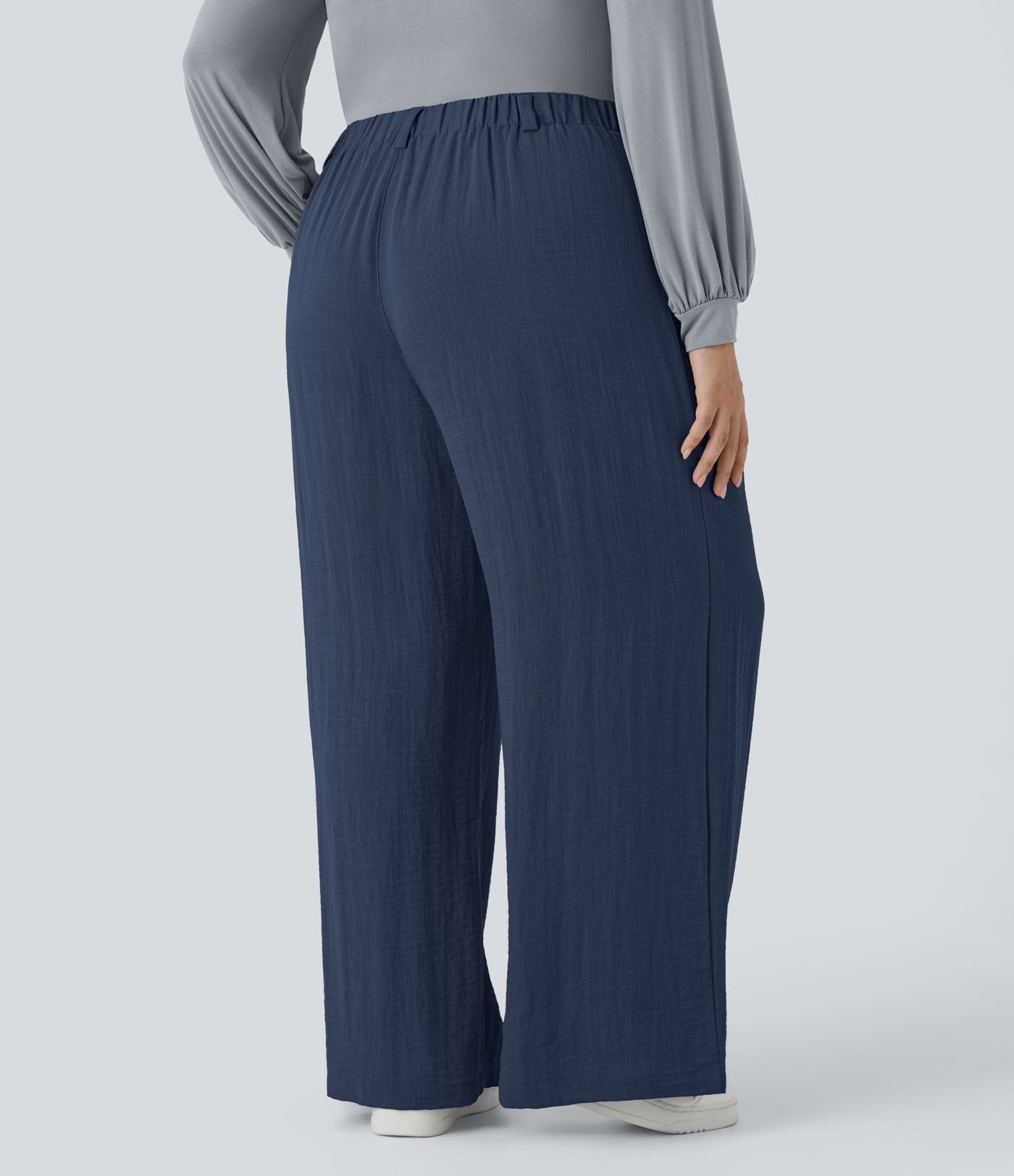 Pantalón tiro alto bolsillo lateral plisado pierna ancha fluido tacto lino talla grande