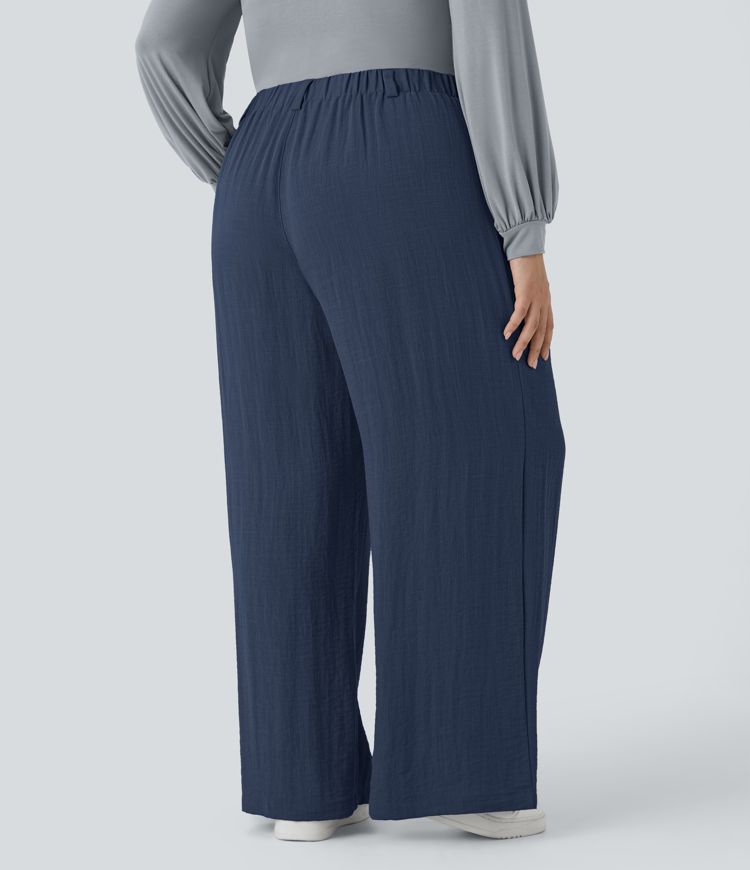 Pantalón tiro alto bolsillo lateral plisado pierna ancha fluido tacto lino talla grande