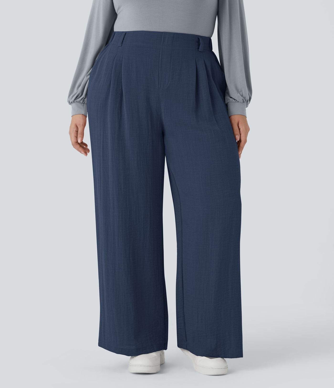 Pantalón tiro alto bolsillo lateral plisado pierna ancha fluido tacto lino talla grande