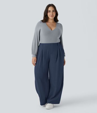 Pantalón tiro alto bolsillo lateral plisado pierna ancha fluido tacto lino talla grande