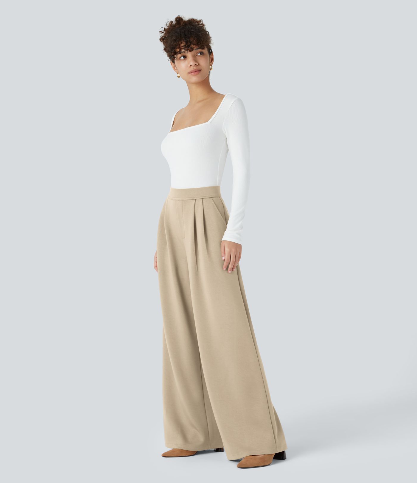 Pantalón oficina tiro alto bolsillo lateral pierna ancha