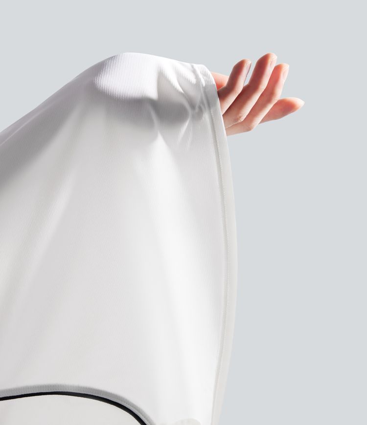 Camiseta deportiva golf ligera ajustada dobladillo curvo cinta bloque color manga raglán