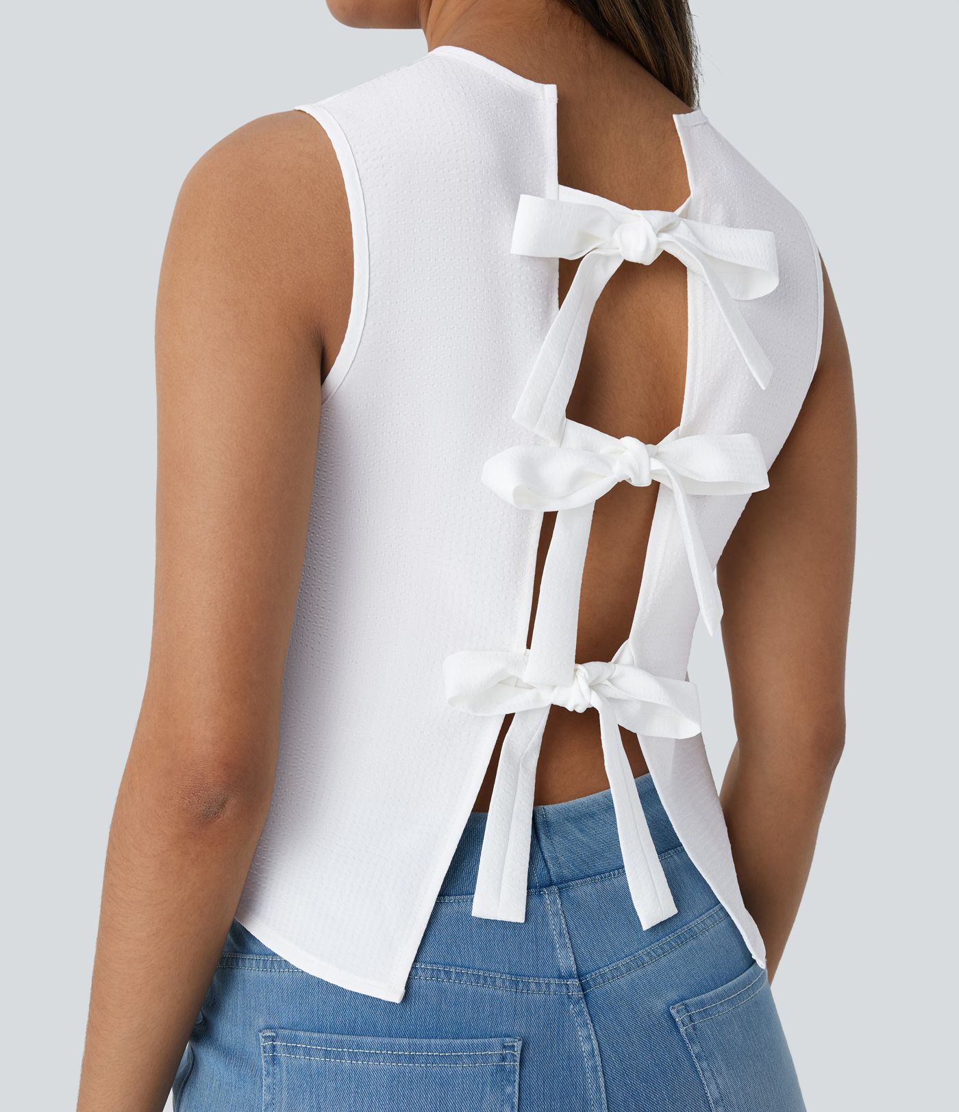 Blusa sin mangas cuello redondo lazo espalda