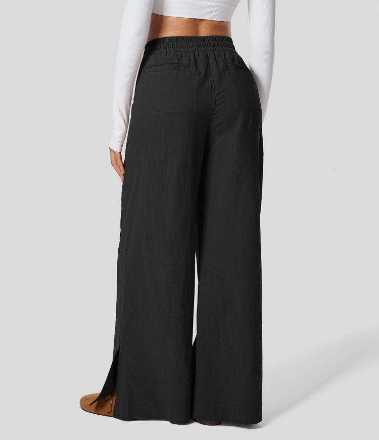 Pantalon Large Palazzo Casual Taille Haute Effet Lin avec Fermeture Éclair Plis Poches Latérales Ourlet Fendu
