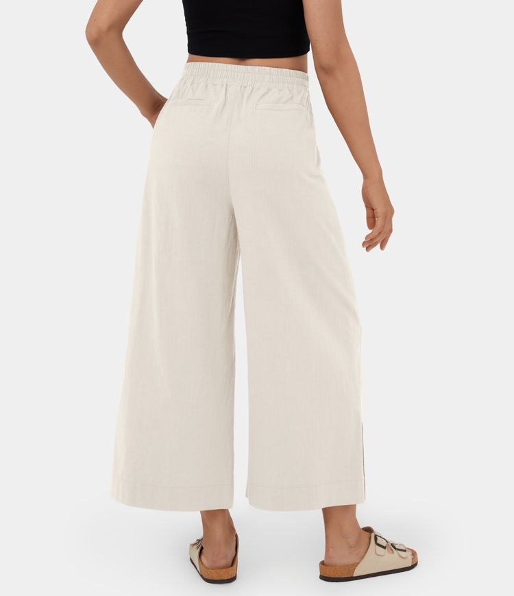 Pantalón capri palazzo lino tiro alto pliegue múltiple bolsillo dobladillo dividido pierna ancha