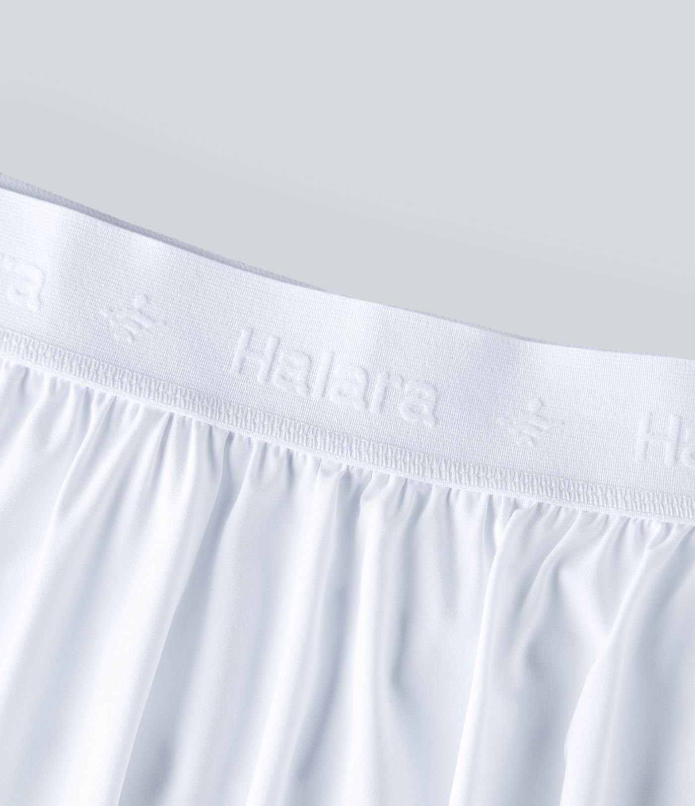 Breezeful™ Hoch taillierter, perforierter 2-in-1-Yogarock mit Seitentasche und ausgestelltem Minirock, schnelltrocknend