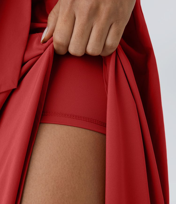 Breezeful™ Falda midi 2 en 1 abertura lateral tiro alto dobladillo curvo fluido acampanado secado rápido