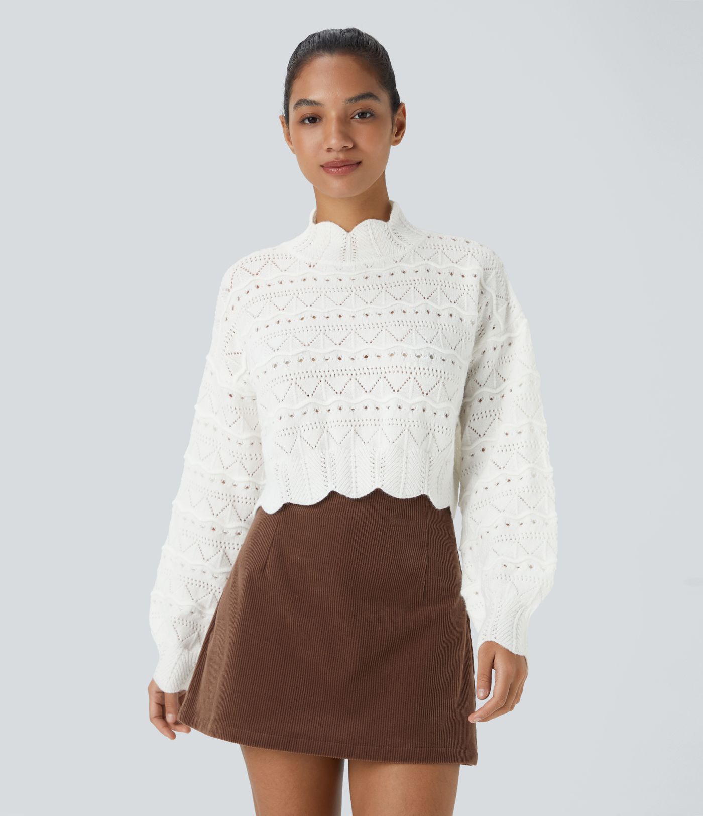 Suéter abierto dobladillo festoneado manga obispo cuello alto