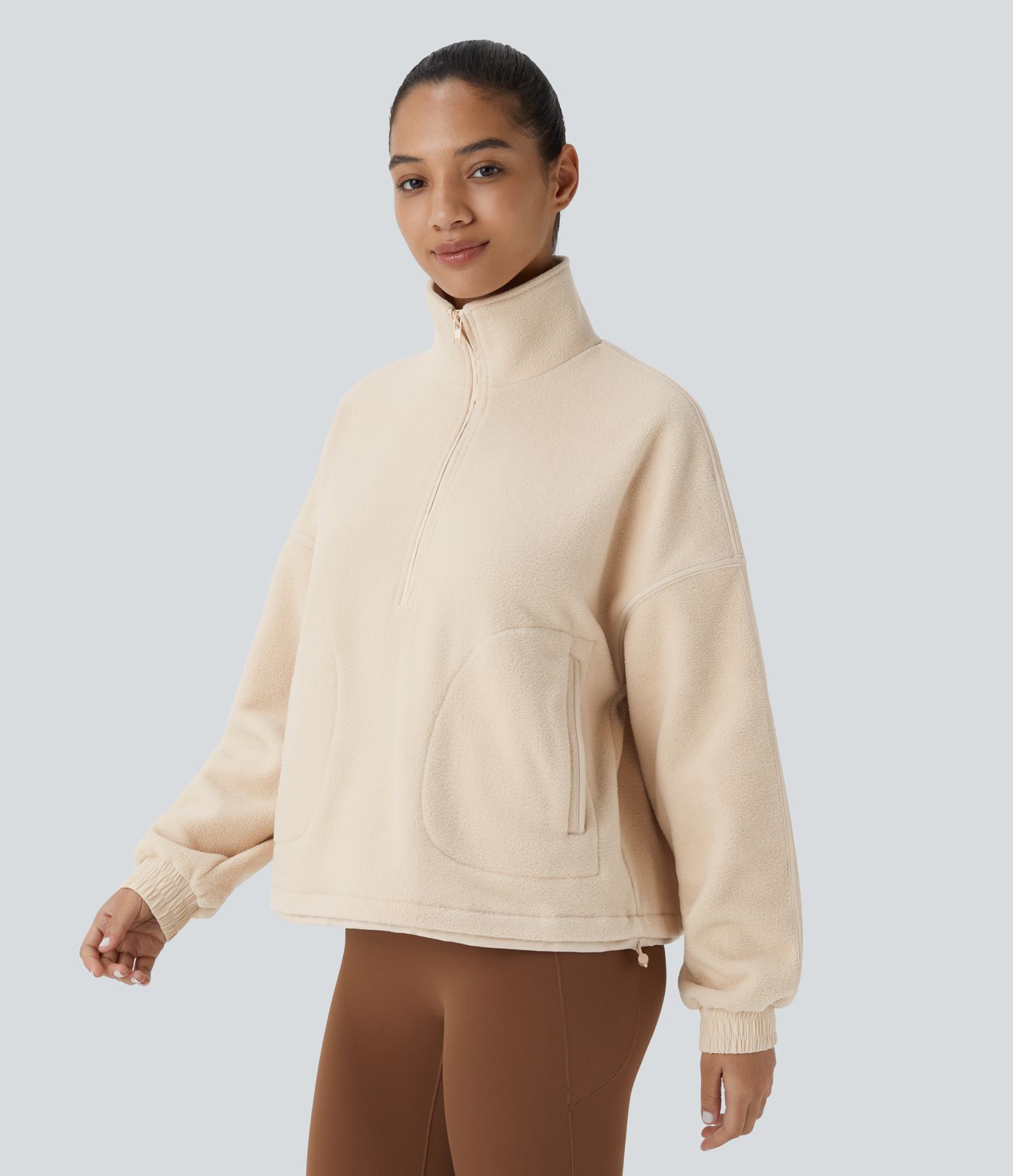 Sudadera deportiva senderismo cuello media cremallera manga larga bolsillo lateral cordón forro polar holgado