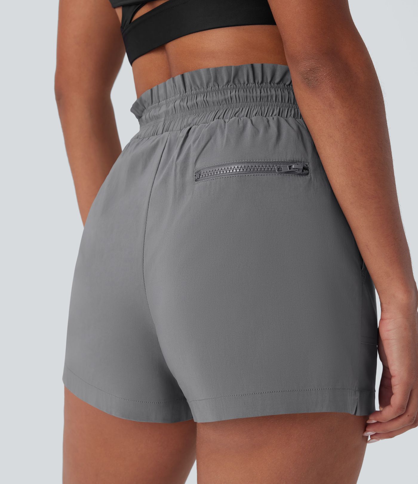 Pantalones cortos de running de cintura alta con bolsillos y cordón