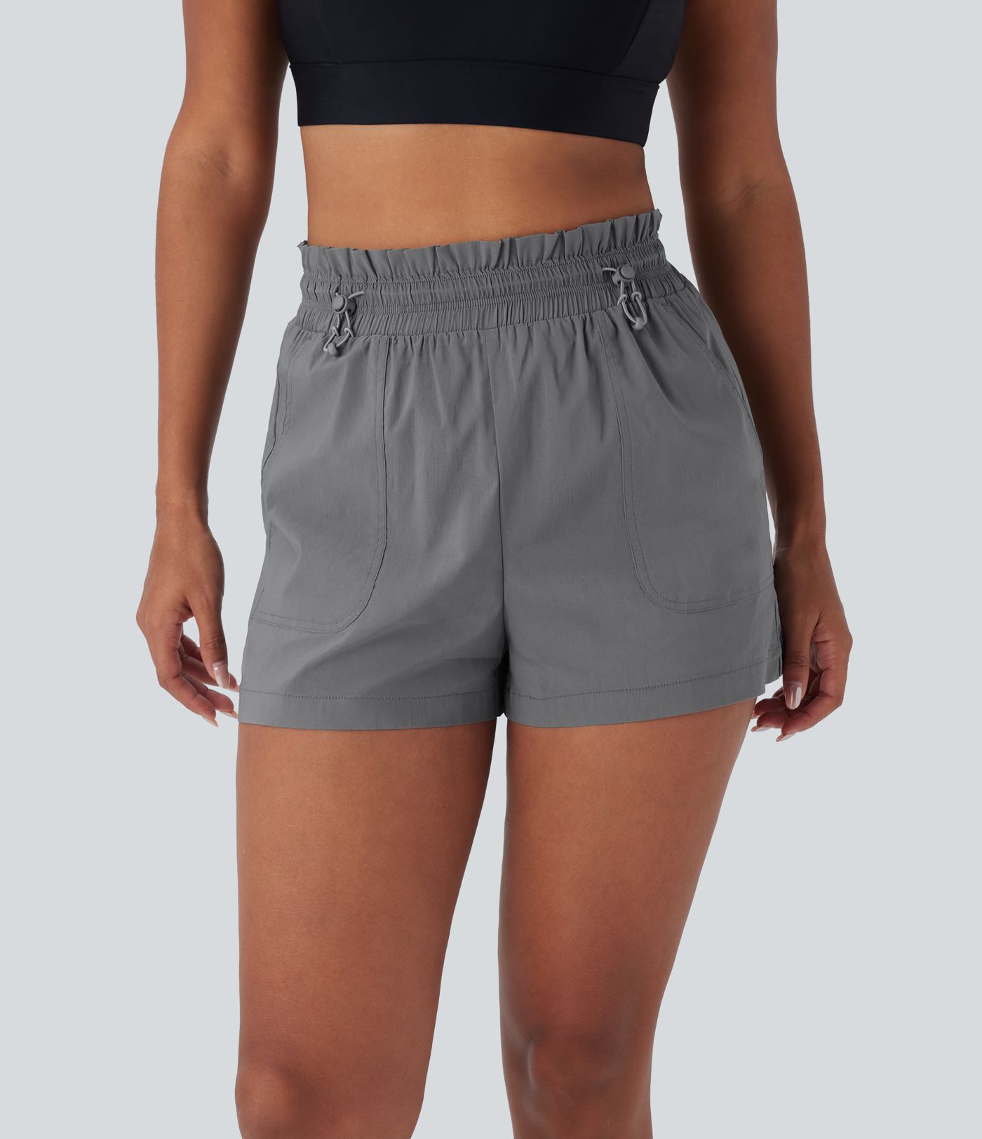 Pantalones cortos de running de cintura alta con bolsillos y cordón