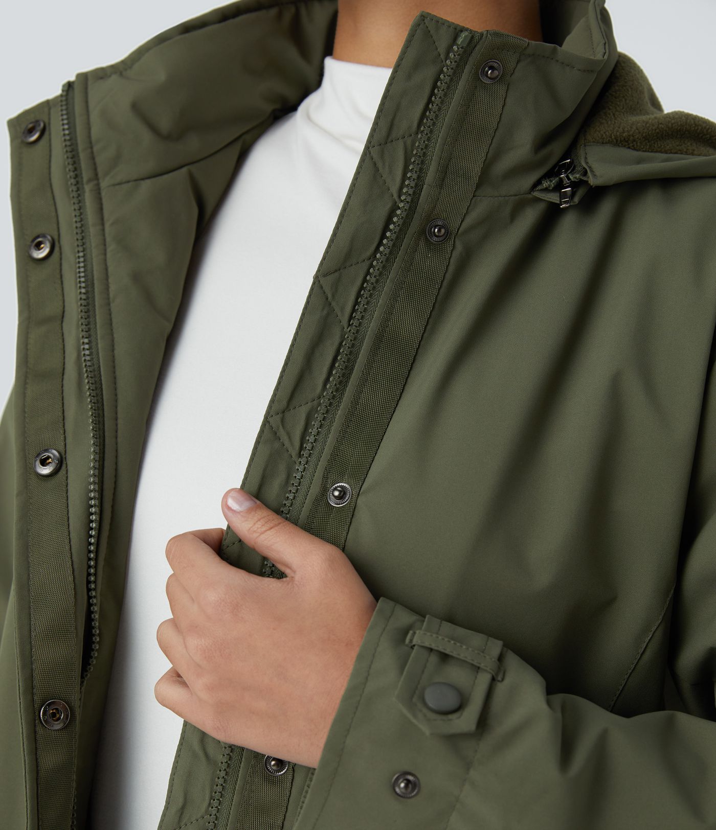 Veste longue de randonnée en polaire avec capuche amovible et col montant