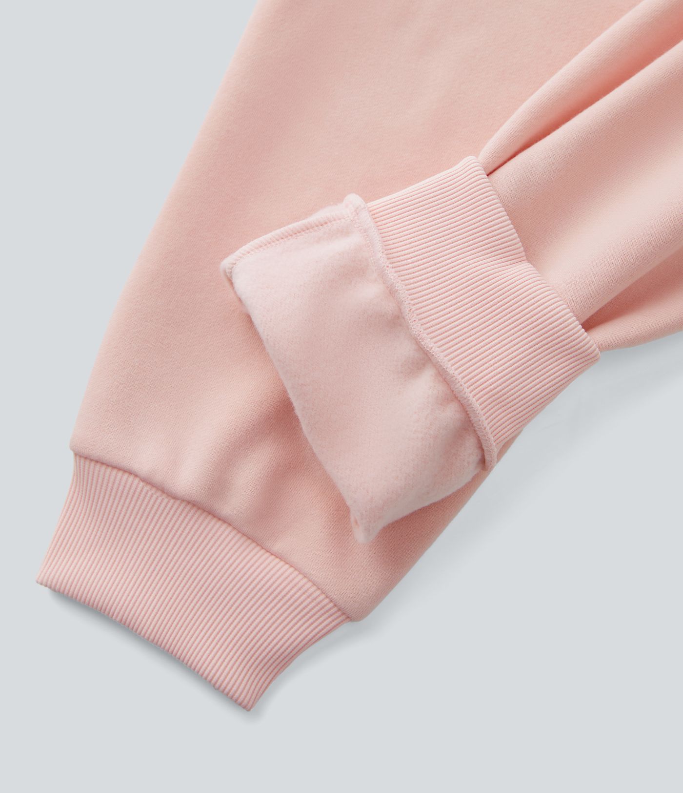 Lässiger Jogger-Jumpsuit aus Fleece mit Kapuze, halbem Reißverschluss, langen Ärmeln und Seitentaschen