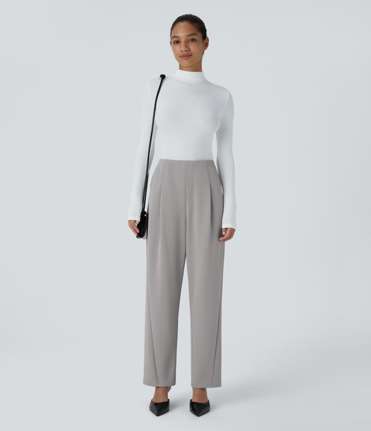 Pantalón crepé pierna acampanada bolsillo lateral tiro alto