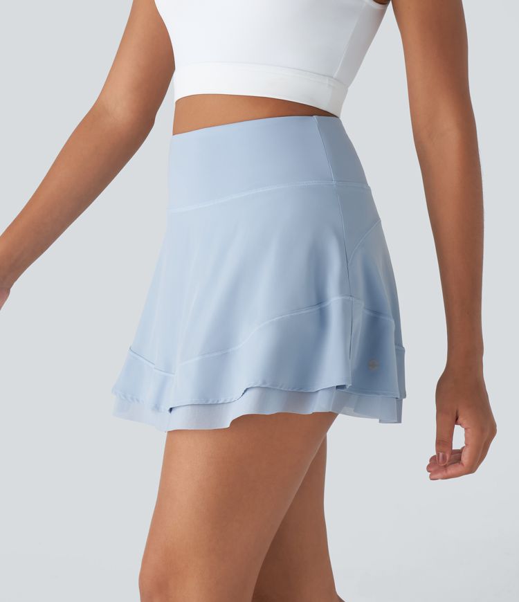 Minifalda Breezeful™ golf secado rápido malla contrastante bolsillo lateral 2 en 1 fruncida tiro alto