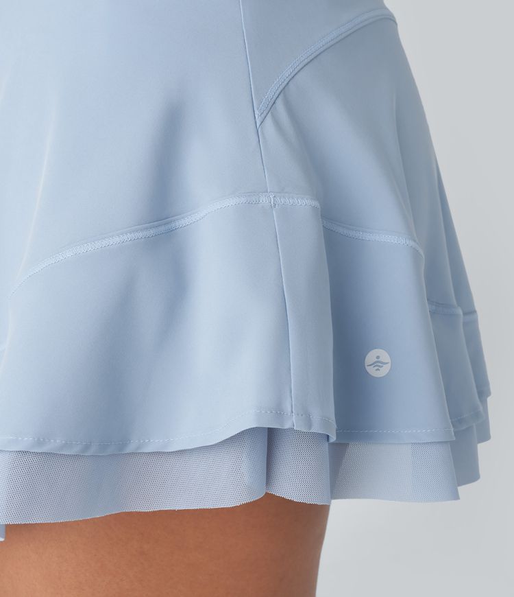 Minifalda Breezeful™ golf secado rápido malla contrastante bolsillo lateral 2 en 1 fruncida tiro alto