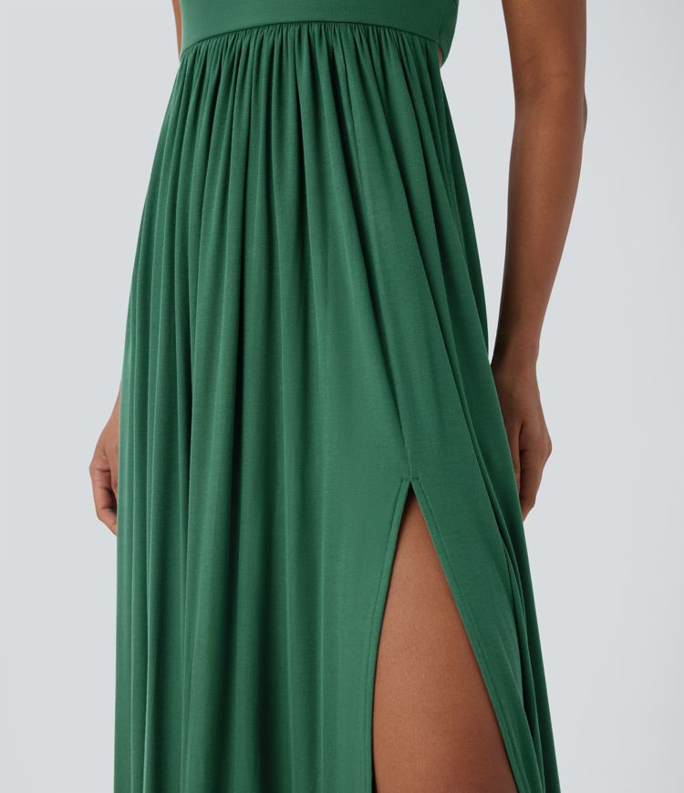 Vestido largo tipo lencero con espalda descubierta, fruncido, abertura y bolsillos