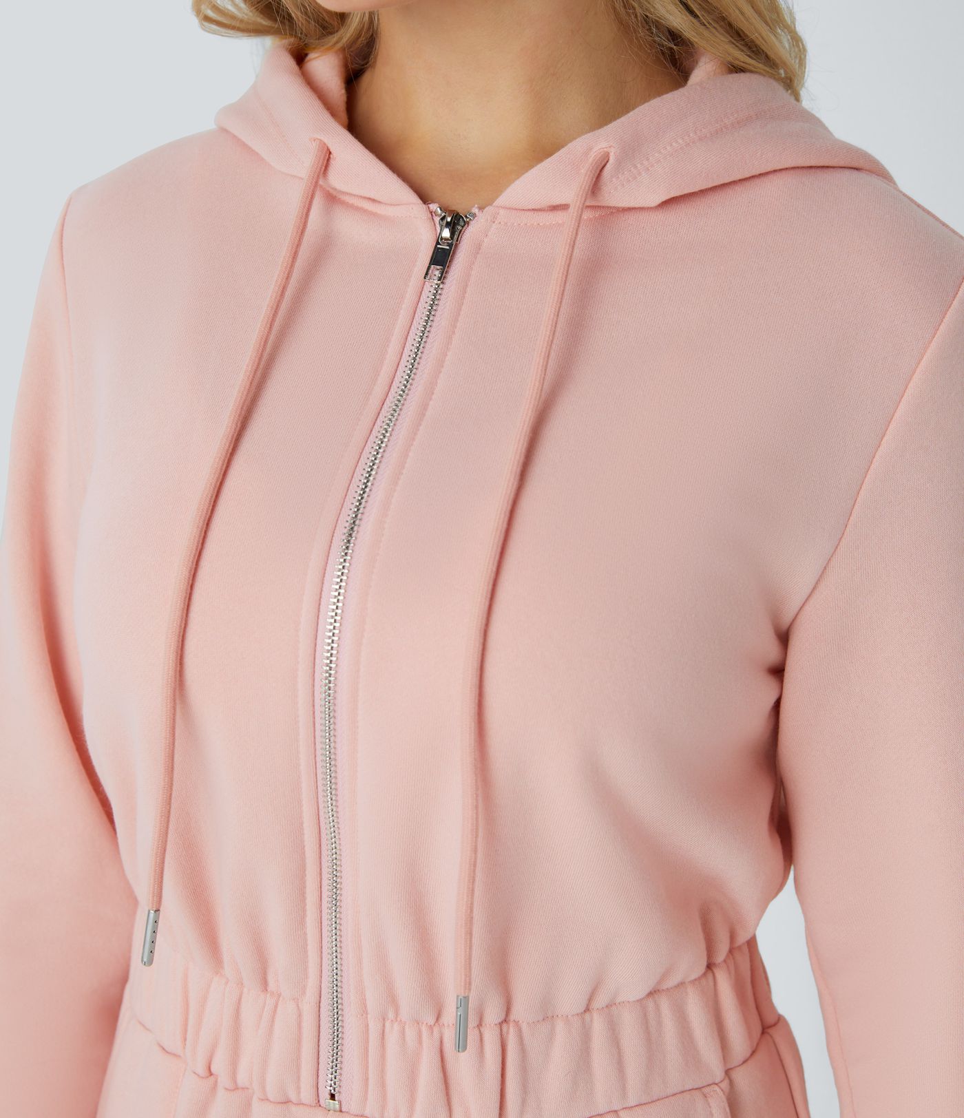 Lässiger Jogger-Jumpsuit aus Fleece mit Kapuze, halbem Reißverschluss, langen Ärmeln und Seitentaschen