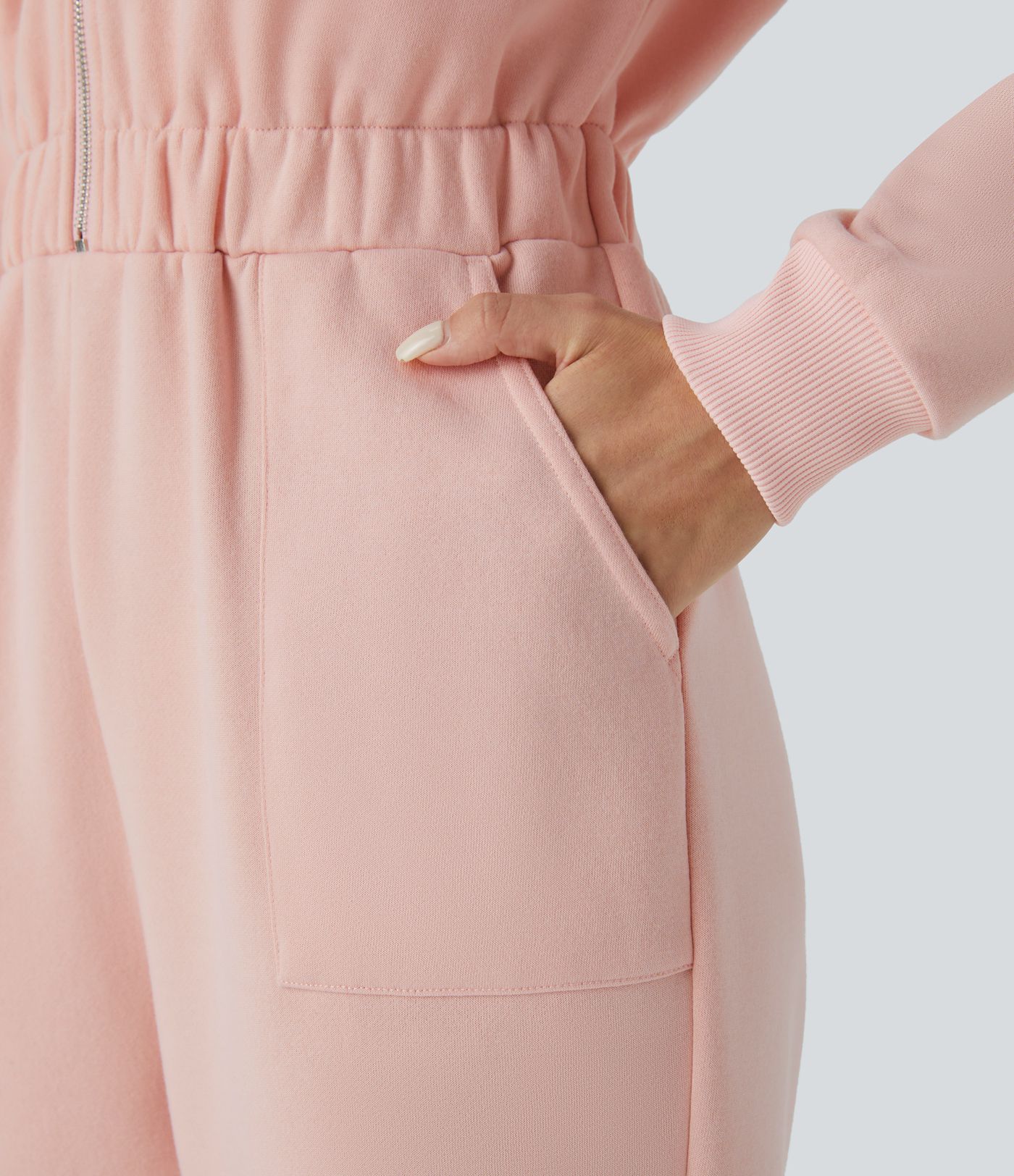 Lässiger Jogger-Jumpsuit aus Fleece mit Kapuze, halbem Reißverschluss, langen Ärmeln und Seitentaschen