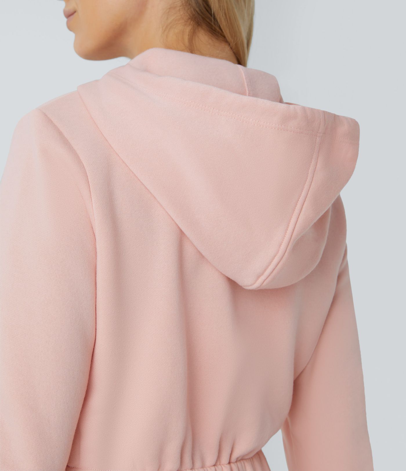 Lässiger Jogger-Jumpsuit aus Fleece mit Kapuze, halbem Reißverschluss, langen Ärmeln und Seitentaschen