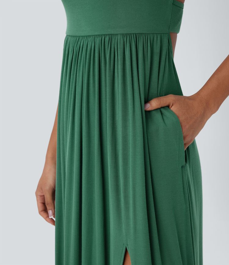 Vestido largo tipo lencero con espalda descubierta, fruncido, abertura y bolsillos