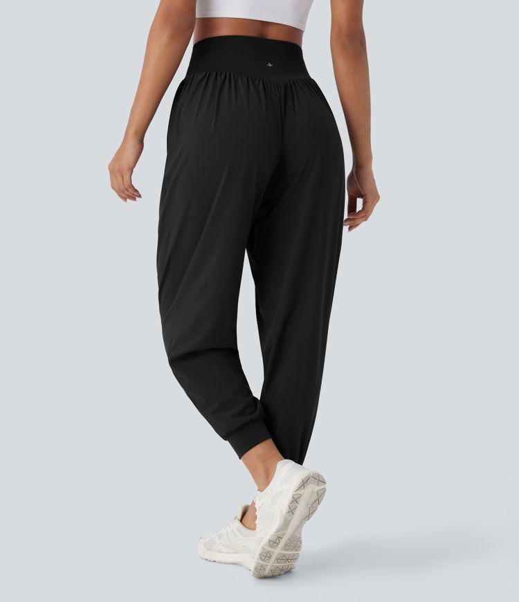 Breezeful™ Crossover joggers de yoga de talle alto con bolsillos y secado rápido Breezeful™ Crossover joggers de yoga de talle alto con bolsillos y secado rápido