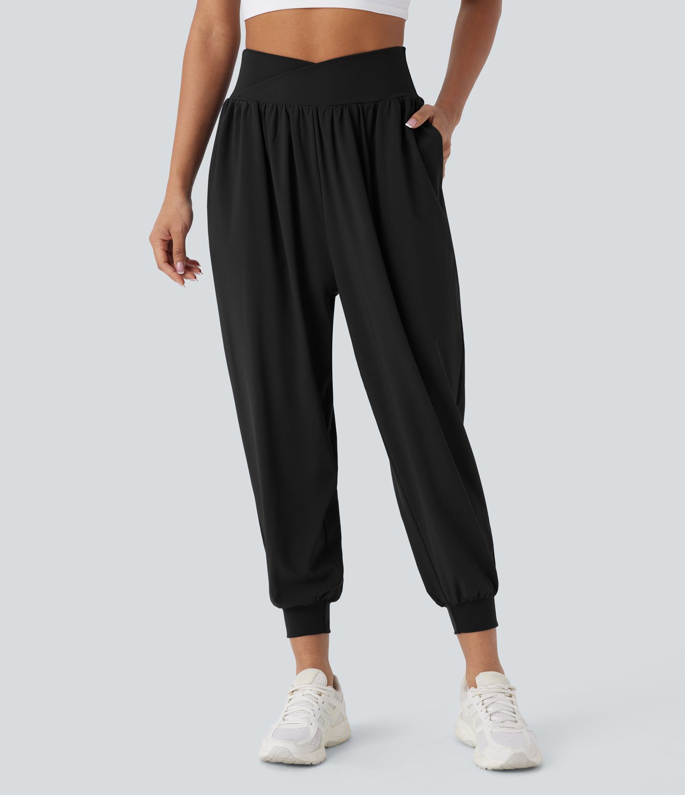 Breezeful™ Crossover joggers de yoga de talle alto con bolsillos y secado rápido Breezeful™ Crossover joggers de yoga de talle alto con bolsillos y secado rápido
