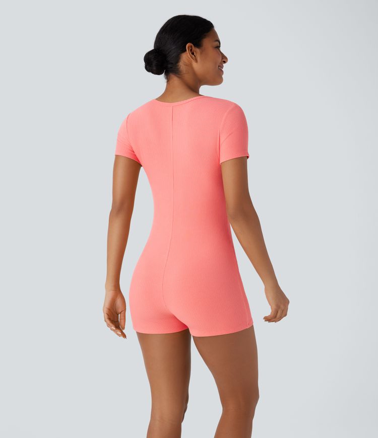 Combinaison décontractée moulante en maille côtelée avec col rond et fermeture éclair