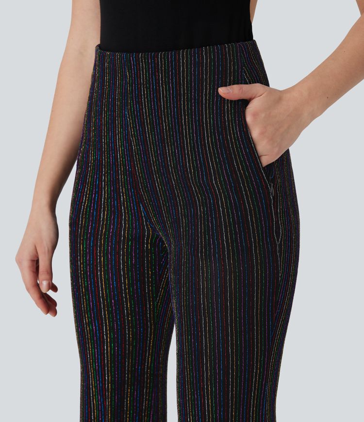 Pantalón acampanado tiro alto bolsillo lateral cremallera raya metálica