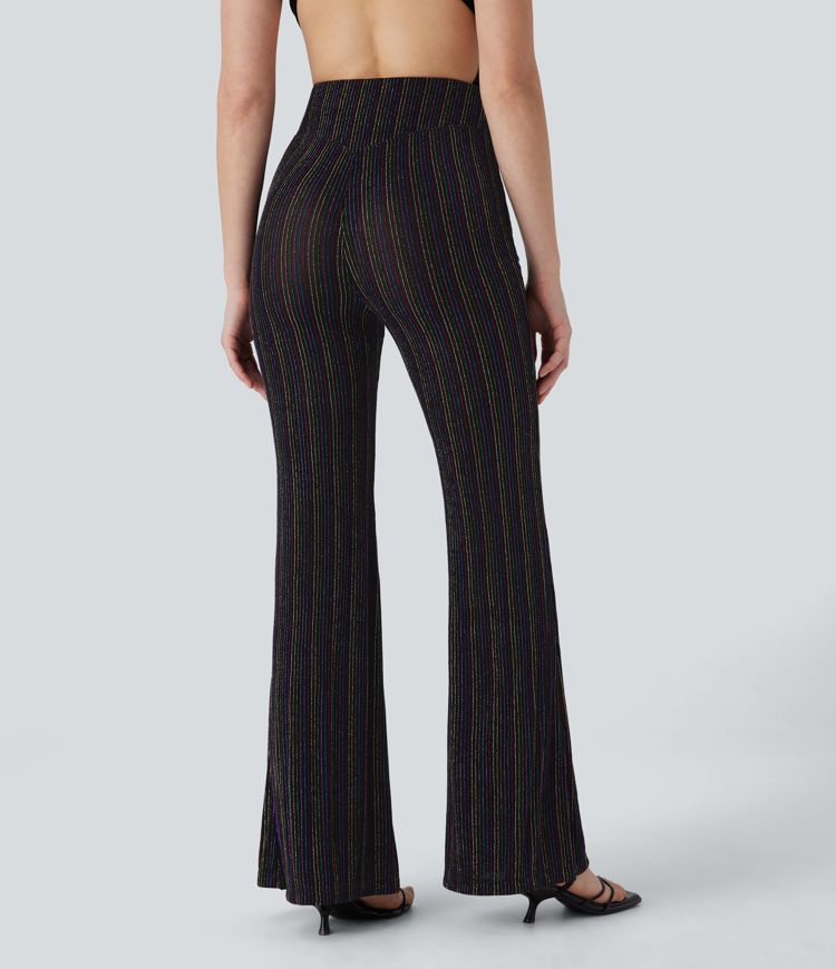 Pantalón acampanado tiro alto bolsillo lateral cremallera raya metálica