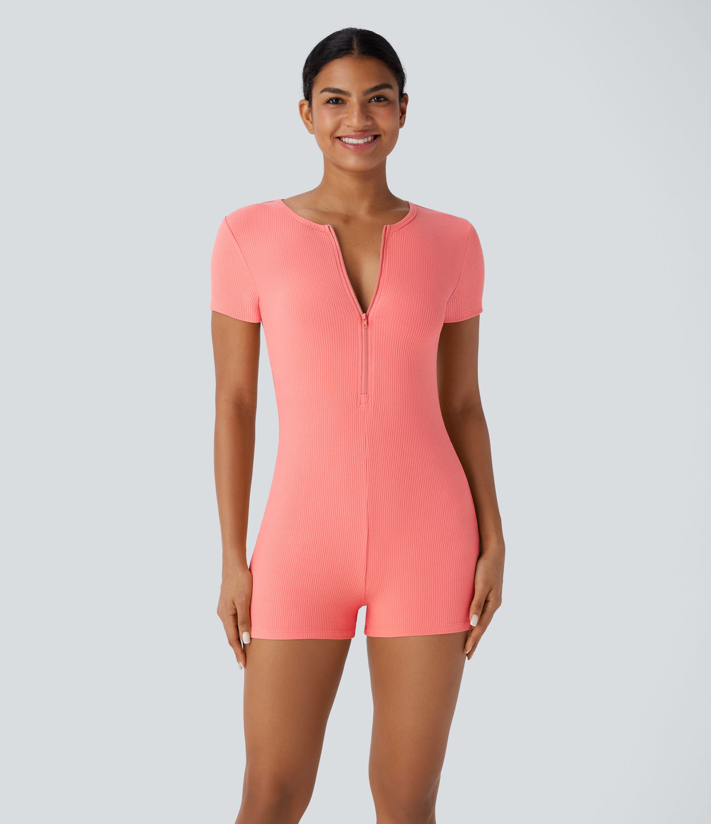 Combinaison décontractée moulante en maille côtelée avec col rond et fermeture éclair