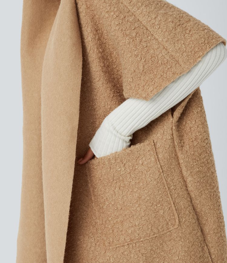 Chaqueta peluche capucha manga corta bolsillo lateral abertura cascada