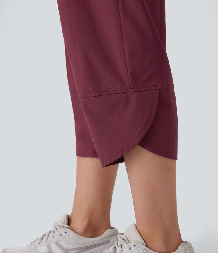 Breezeful™ Sleeveless Pockets Crossover Hem Capri Quick Dry Yoga Jumpsuit