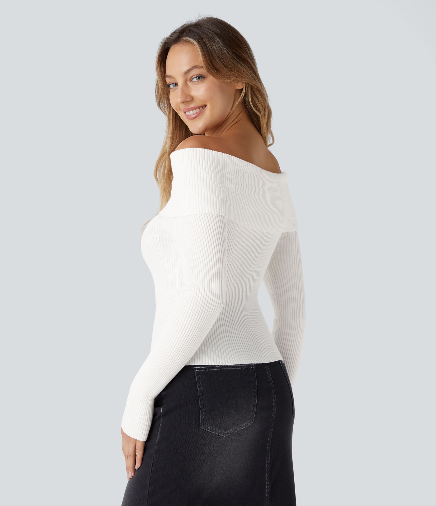 Suéter manga larga sin hombro doblado